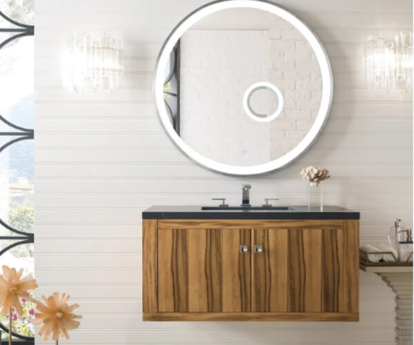Floating walnut vanity with round LED mirror
