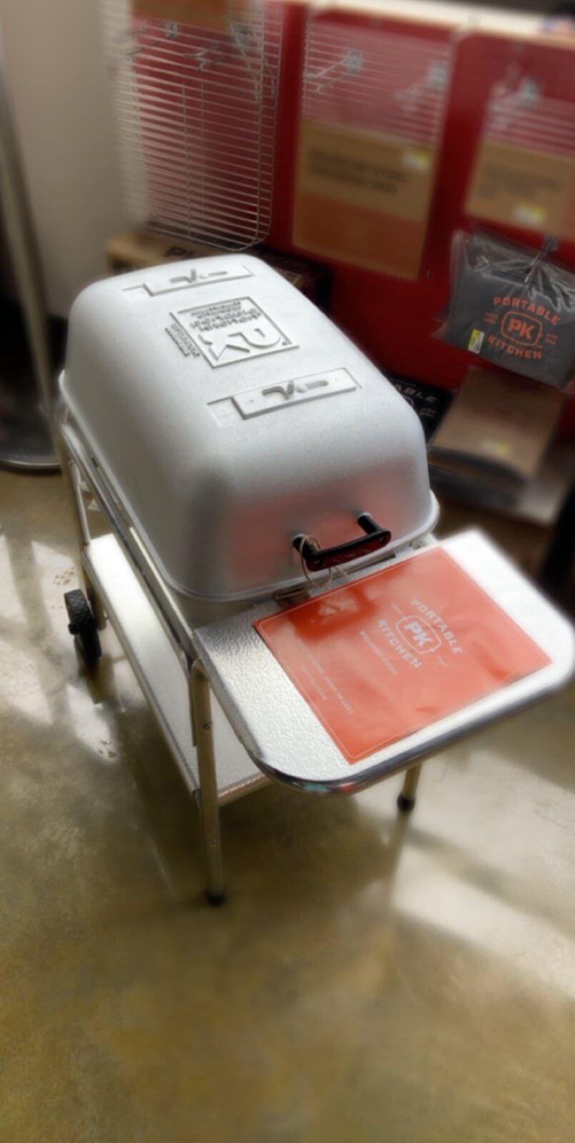 PK Grill portable charcoal grill on stand at Kaufman Lumber<br />
